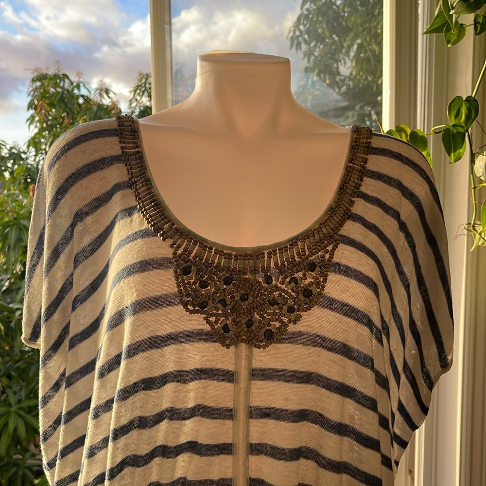 Beach coverup with beaded detailing